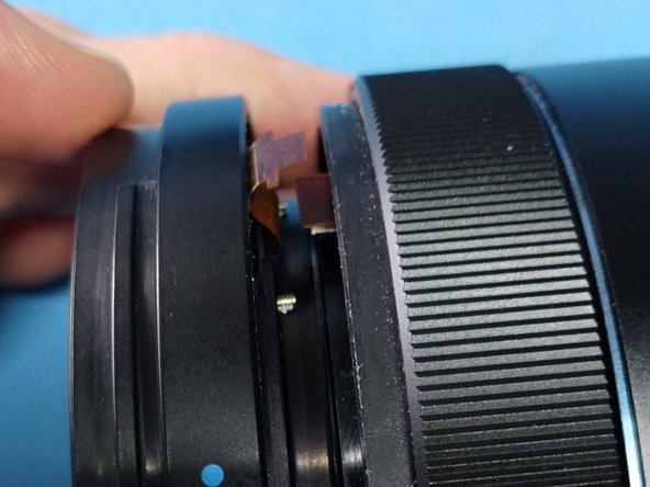 Samsung NX 50-150 f/2.8 S Lens - Focus Cable Repair, iFn Sleeve removal: crwdns2935265:017crwdnd2935265:02crwdnd2935265:03crwdne2935265:0