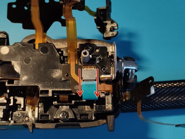 Sony A7 II Top Flex Cable replacement, Remove flex cable from connector: crwdns2935265:028crwdnd2935265:02crwdnd2935265:03crwdne2935265:0