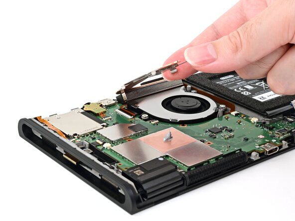 Nintendo Switch 2 Board Replacement, Install the heat sink: crwdns2935265:079crwdnd2935265:02crwdnd2935265:03crwdne2935265:0