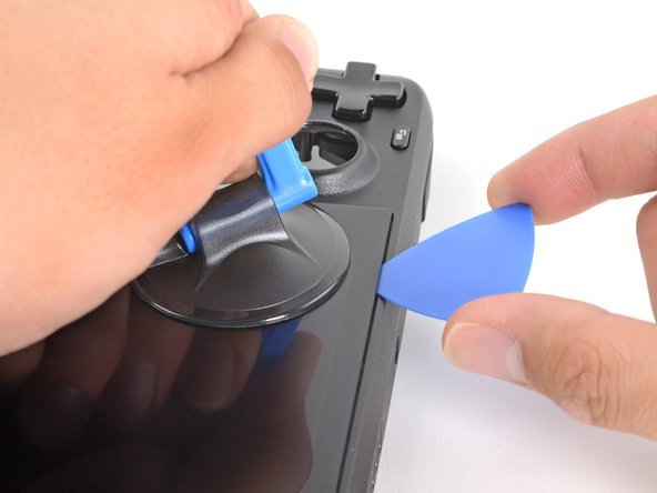 Steam Deck Front Shell Replacement, Insert an opening pick: crwdns2935265:076crwdnd2935265:03crwdnd2935265:03crwdne2935265:0