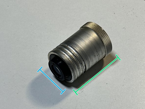 Zeiss Ikon Movielux Compact Projector Teardown, Removing the lens: crwdns2935265:010crwdnd2935265:02crwdnd2935265:03crwdne2935265:0