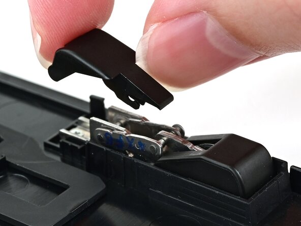 Nintendo Switch 2 Kickstand Replacement, Install the upper hinge covers: crwdns2935265:027crwdnd2935265:01crwdnd2935265:03crwdne2935265:0