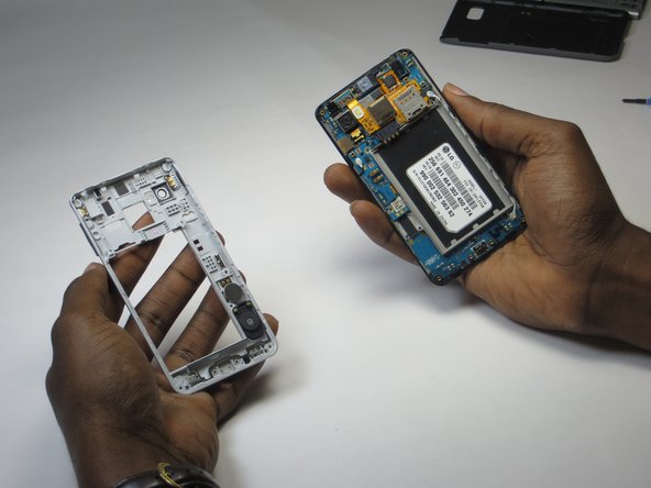 LG VM720 Volume Button Removal: step 3, image 2 of 2