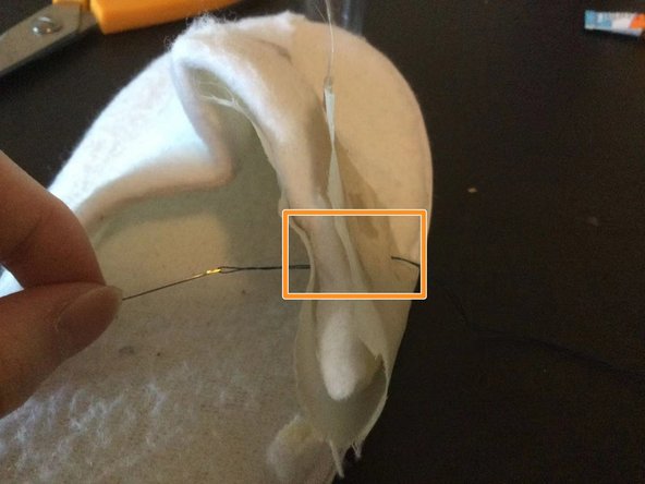 How to Fix a Torn Slipper, Sewing the cloth to the shoe: step 4, image 2 of 3