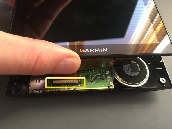 Garmin Nuvi 2529 Disassembly, Prying off the back cover: crwdns2935265:02crwdnd2935265:03crwdnd2935265:03crwdne2935265:0