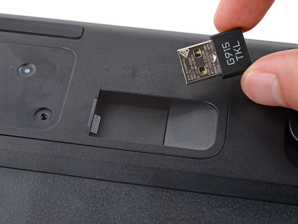 Logitech G915 TKL Battery Replacement, Remove the USB receiver: crwdns2935265:05crwdnd2935265:03crwdnd2935265:03crwdne2935265:0