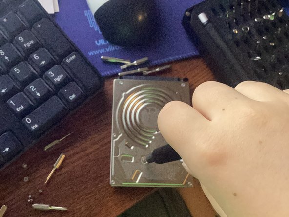 2.5" Toshiba SATA Hard Drive Teardown, The Back Cover: crwdns2935265:02crwdnd2935265:02crwdnd2935265:03crwdne2935265:0