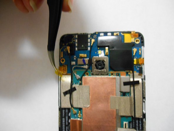 HTC One Mini Motherboard Replacement, Remove protective foil.: crwdns2935265:011crwdnd2935265:03crwdnd2935265:03crwdne2935265:0