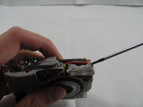 Removing Olympus FE-210 Flash Assembly, Flash Assembly: crwdns2935265:07crwdnd2935265:02crwdnd2935265:02crwdne2935265:0