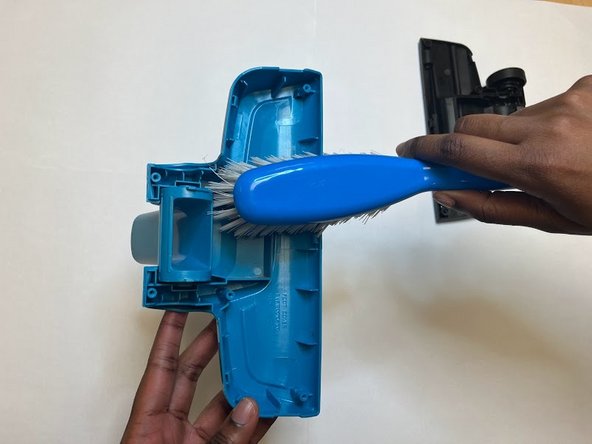 Disassembly and Cleaning of Series 2033 Bissell Featherweight Stick Bagless Vacuum Cleaner, Clean Foot Interior: step 5, image 2 of 2