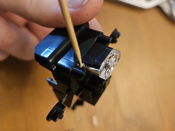 Nespresso Vertuo Next Pod holder , barcode reader and drain pipe Replacement, Remove the barcode reader and its associated electronics: step 12, image 2 of 3
