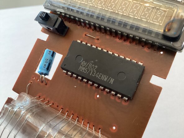 Qualitron 24K Calculator Teardown: crwdns2935265:05crwdnd2935265:02crwdnd2935265:02crwdne2935265:0