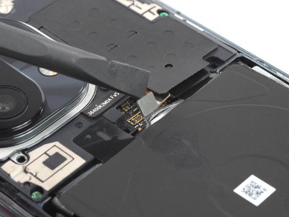 Mi 11 Screen Replacement, Disconnect the right battery cable: crwdns2935265:011crwdnd2935265:02crwdnd2935265:02crwdne2935265:0