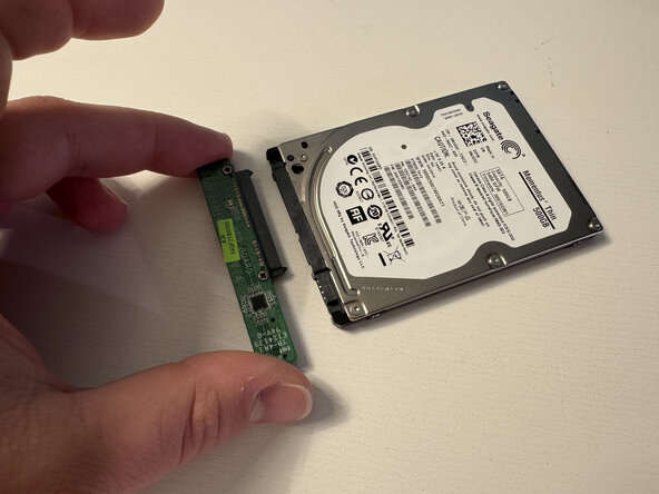Dell Inspiron 20 3043 Hard Drive Replacement, Remove the hard drive connector board: step 4, image 3 of 3