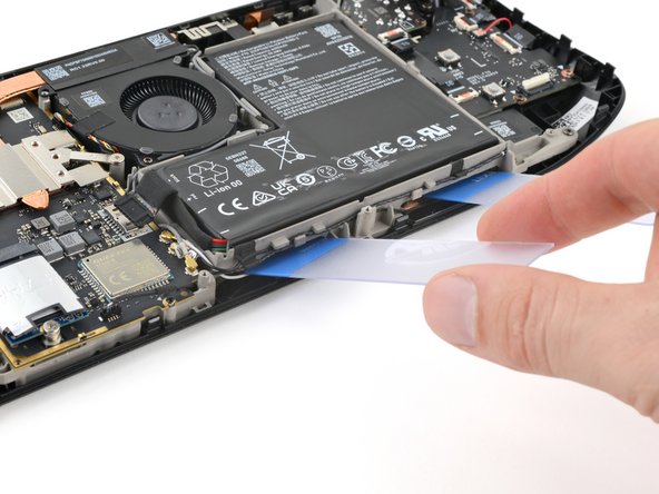 Steam Deck OLED Battery Replacement, Insert the plastic cards: crwdns2935265:022crwdnd2935265:03crwdnd2935265:03crwdne2935265:0