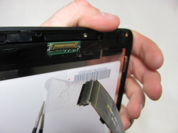 Sony Vaio Fit 13A Screen Replacement, Remove Strip: crwdns2935265:05crwdnd2935265:02crwdnd2935265:03crwdne2935265:0