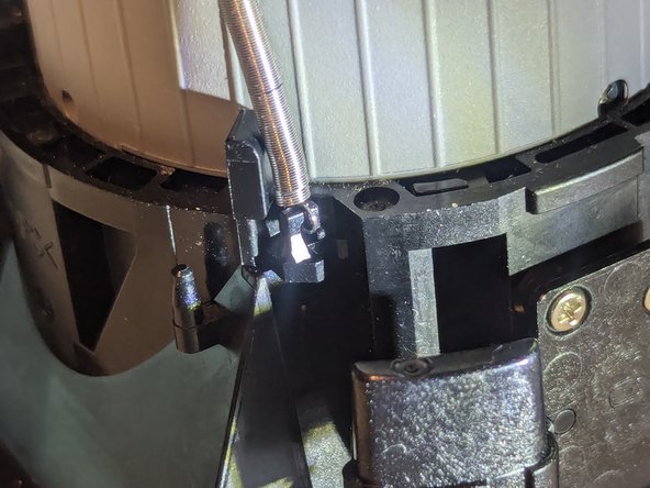 Fujifilm Instax Mini 9 Camera Shell Replacement, Brightness Dial Return Spring: crwdns2935265:015crwdnd2935265:02crwdnd2935265:03crwdne2935265:0