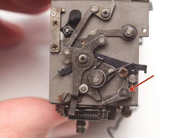 Pentax MX Mirror Box Mechanism Disassembly, Remove mirror release latch: step 21, image 1 of 3