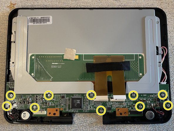Sony DVP-FX820 Full Teardown, Freeing the Screen Motherboard: crwdns2935265:022crwdnd2935265:02crwdnd2935265:03crwdne2935265:0