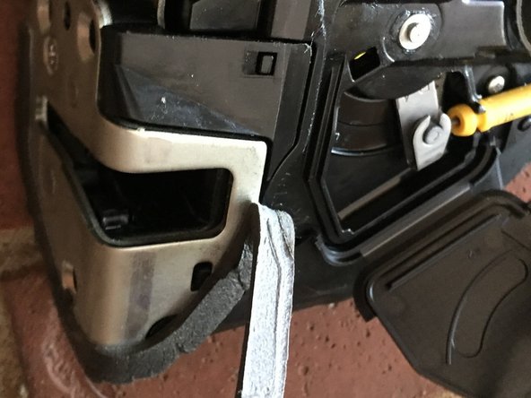 2012 Toyota Highlander Door Lock Actuator Motor Replacement, Disassemble the door lock actuator: crwdns2935265:014crwdnd2935265:02crwdnd2935265:02crwdne2935265:0