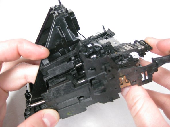 The final tab is located below the backside of the photo-counter dial.