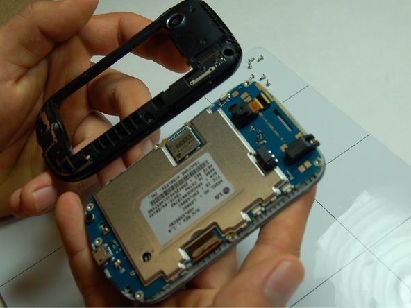 LG 305C  Touch Screen Assembly Replacement: crwdns2935265:08crwdnd2935265:02crwdnd2935265:02crwdne2935265:0