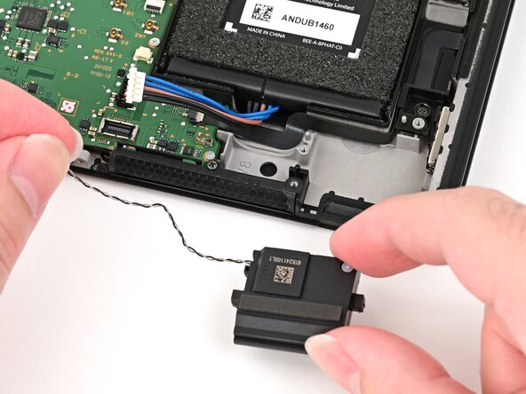 Nintendo Switch 2 Left Joy-Con 2 Connector Replacement, Install the left speaker: crwdns2935265:049crwdnd2935265:01crwdnd2935265:03crwdne2935265:0