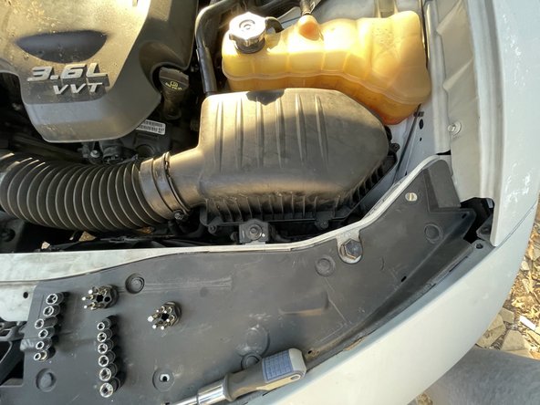 2015 Dodge Charger SXT Headlight Replacement: step 9, image 3 of 3