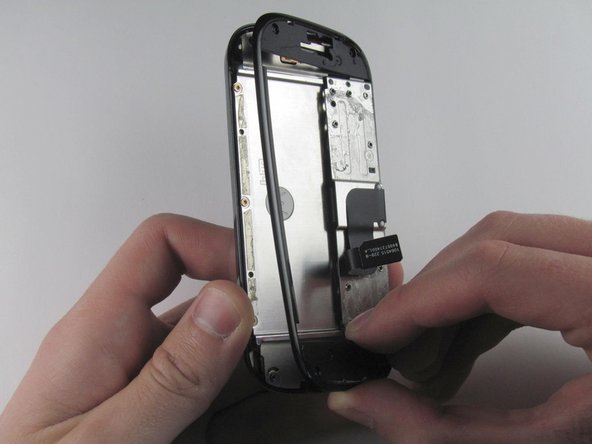 Disassembling Motorola Cliq LCD Shield Plate: crwdns2935265:017crwdnd2935265:03crwdnd2935265:03crwdne2935265:0