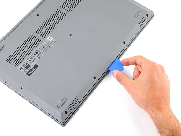 Lenovo IdeaPad 3-15IIL05 RAM Replacement, Release the bottom clips: crwdns2935265:05crwdnd2935265:02crwdnd2935265:03crwdne2935265:0