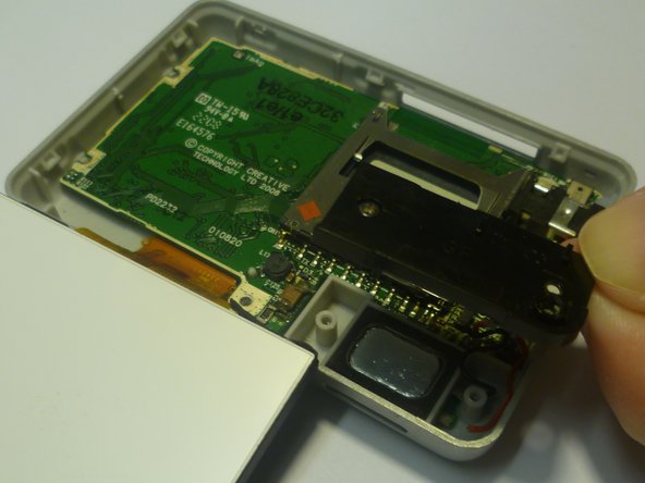 Replacing Creative Zen X-Fi Speaker, Unscrew Speaker's Cover: crwdns2935265:08crwdnd2935265:02crwdnd2935265:02crwdne2935265:0