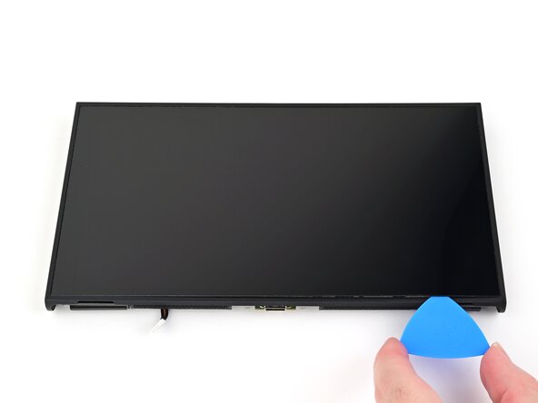 Nintendo Switch 2 Screen Replacement, Separate the bottom adhesive: crwdns2935265:048crwdnd2935265:01crwdnd2935265:02crwdne2935265:0