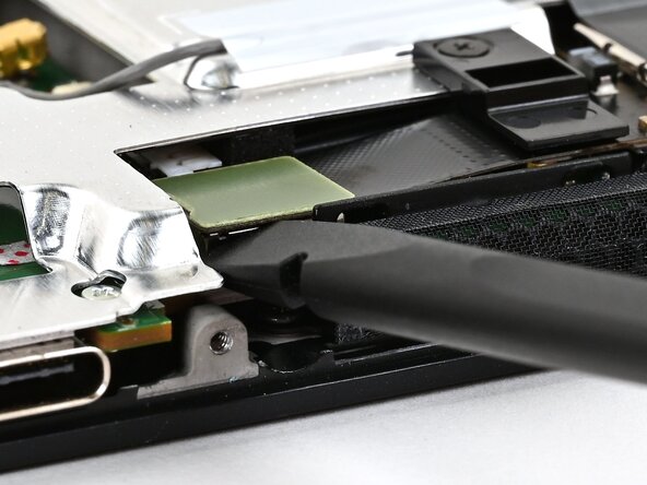 Nintendo Switch 2 MicroSD Card Reader Replacement, Disconnect the MicroSD card reader: crwdns2935265:019crwdnd2935265:02crwdnd2935265:03crwdne2935265:0