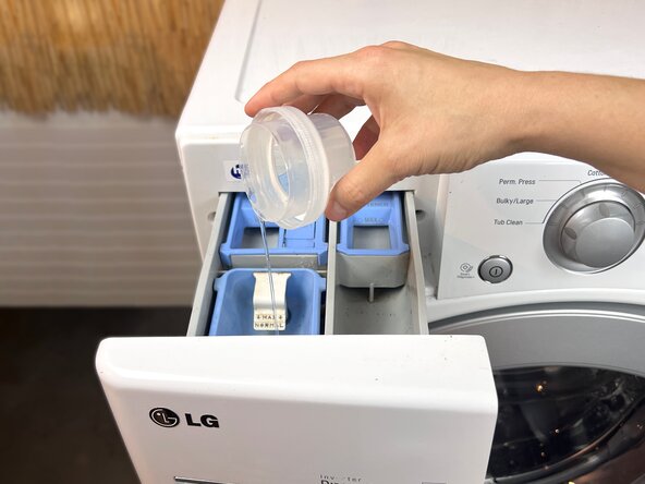 How to Wash and Dry a Patagonia Down Jacket, Add detergent: step 4, image 1 of 2