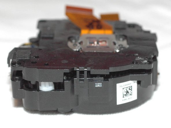 Repairing Casio Exilim EX-Z350 Lens mechanics, Open lens / sensor assembly: crwdns2935265:011crwdnd2935265:03crwdnd2935265:03crwdne2935265:0