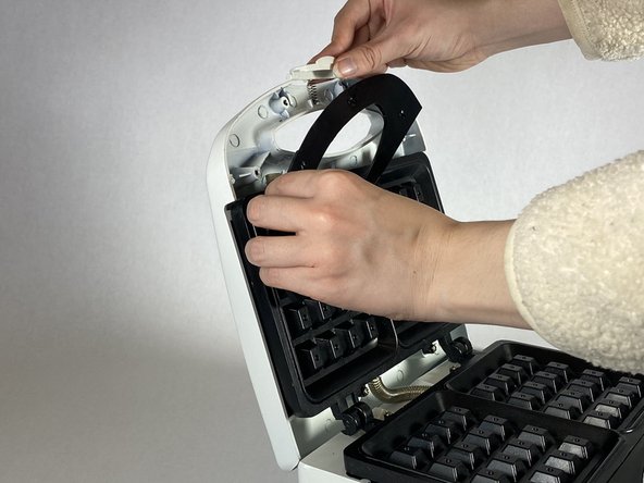 Kitchen Gourmet Waffle Maker Release Latch Spring Replacement: step 5, image 2 of 3
