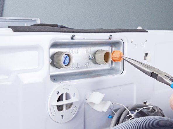 LG WM3050CW Inlet Valve Assembly Replacement, Remove the filters: crwdns2935265:012crwdnd2935265:02crwdnd2935265:03crwdne2935265:0