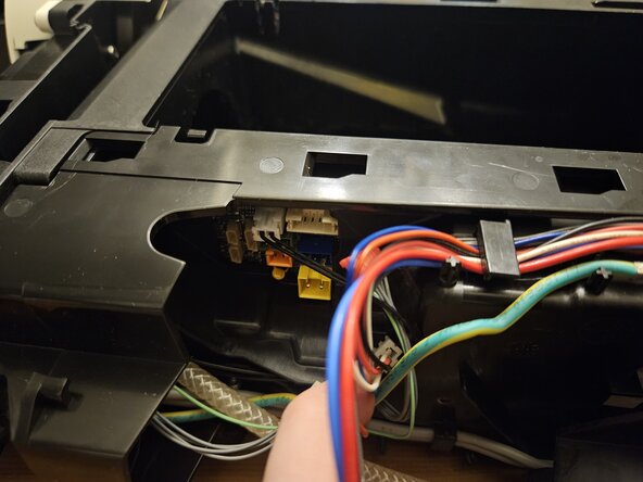 Nespresso Vertuo Next Pod holder , barcode reader and drain pipe Replacement, Unplug the wires from rear panel panel: step 9, image 1 of 3