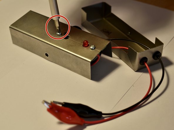 Continuity Tester Teardown, Unscrew other top screw: step 8, image 1 of 1