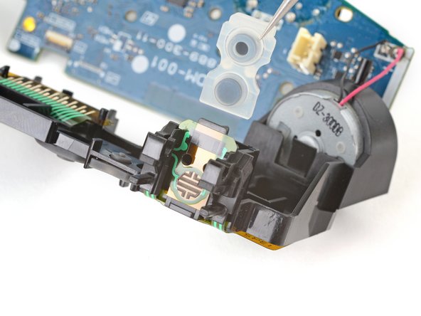 DualShock 4 (CUH-ZCT1U) R2 and L2 Buttons Replacement, Remove the silicone button pads: crwdns2935265:025crwdnd2935265:03crwdnd2935265:03crwdne2935265:0