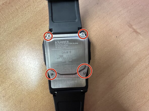 Casio Databank 2888 DBC-32 Battery Replacement, Remove Screws Holding Caseback on: step 1, image 1 of 1