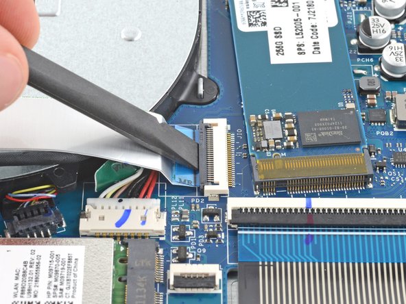 HP 15-dw Fan Replacement, Disconnect the interconnect cable: crwdns2935265:016crwdnd2935265:02crwdnd2935265:03crwdne2935265:0