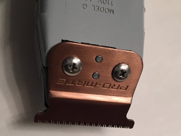 Andis T Outliner Trimmer with T Blade Model G Top Blade Replacement, Clean and lubricate the device if necessary.: crwdns2935265:05crwdnd2935265:02crwdnd2935265:02crwdne2935265:0