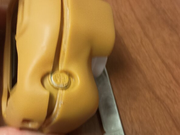 Omega Mart Photato unsticking shutter/select button, Stuck Shutter/select button: step 1, image 2 of 3
