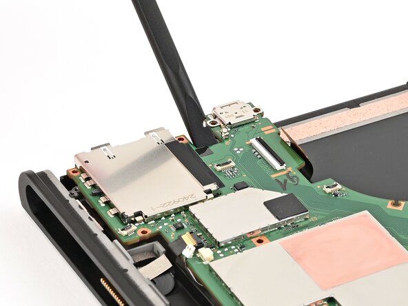 Nintendo Switch 2 Board Replacement, Lift the board: crwdns2935265:059crwdnd2935265:02crwdnd2935265:02crwdne2935265:0