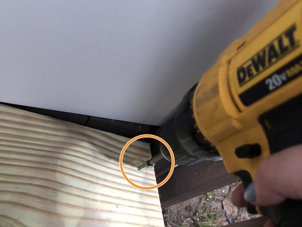 Secure the wood (tread) into place by drilling 2&quot; galvanized Phillips head screws into the pilot holes.