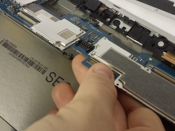 Samsung Galaxy Note 10.1 Speaker Replacement, Removing the Motherboard: crwdns2935265:06crwdnd2935265:02crwdnd2935265:03crwdne2935265:0