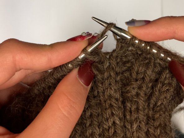 How to Pick Up a Dropped Stitch in Knitting: step 6, image 2 of 3
