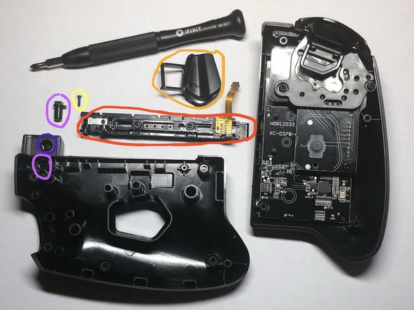 Left Controller, Disassemble back half: crwdns2935265:04crwdnd2935265:02crwdnd2935265:02crwdne2935265:0