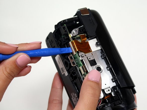 Canon Vixia HF R600 Power Button Replacement, Speaker: crwdns2935265:07crwdnd2935265:02crwdnd2935265:02crwdne2935265:0